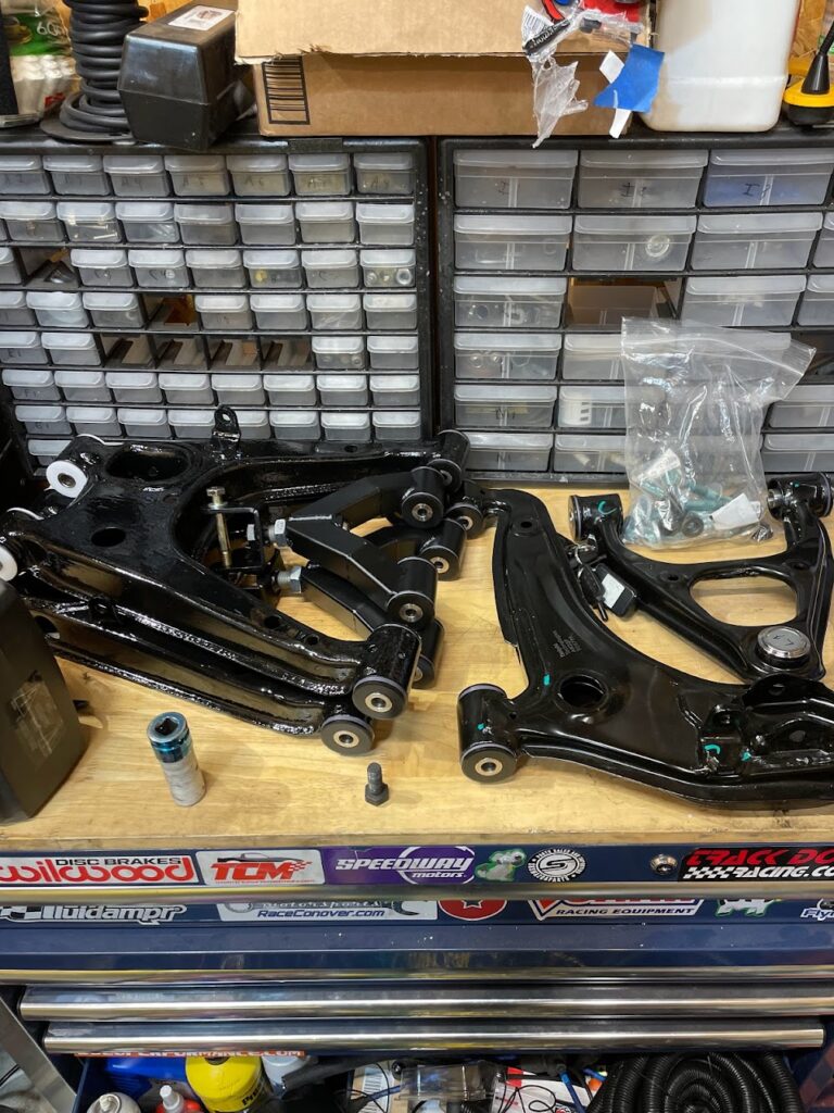 NB Miata control arms ready for installation, December 2022